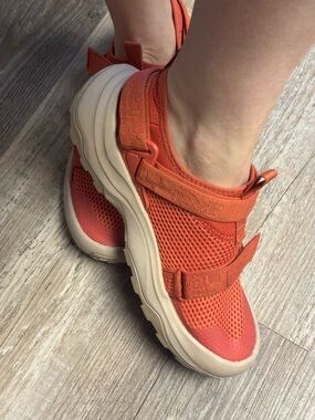 Teva Women's Outflow Universal Water Shoe in Coral Orange with Cream Sole